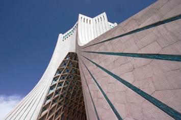 Built in Tehran in 1971, the Shayyad Tower (Remembrance of the Kings/Shahs) ... now commonly referred to as the Azadi Tower (Freedom Tower) ... is considered as "the Gateway to Iran".  The magnificent structure, which is totally clad in cut marble and stands 148 ft. tall, was designed by architect Hossein Amanat.  Photo by Swedish photographer Farhad Towfighian.